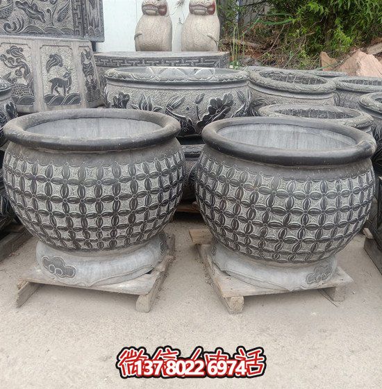 自然美學(xué)結(jié)合青石石雕、浮雕、編織、雕塑的戶外園林魚(yú)缸